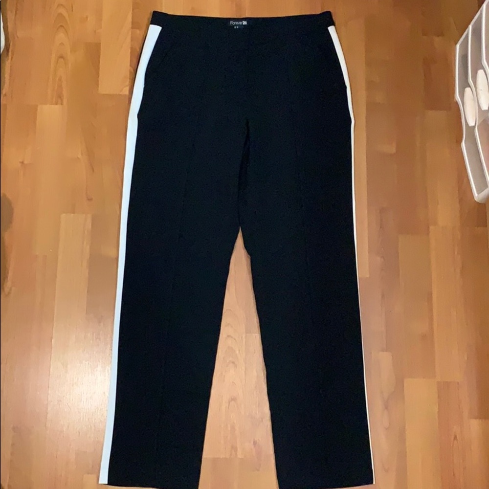 Black dress pants with a white stripe